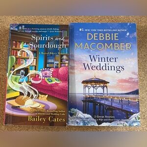 Pair of Paperback Books in Pink and Light Blue Spirits and sourdough & Winter